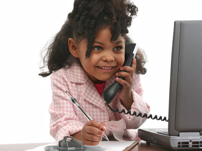 small child playing on the telephone